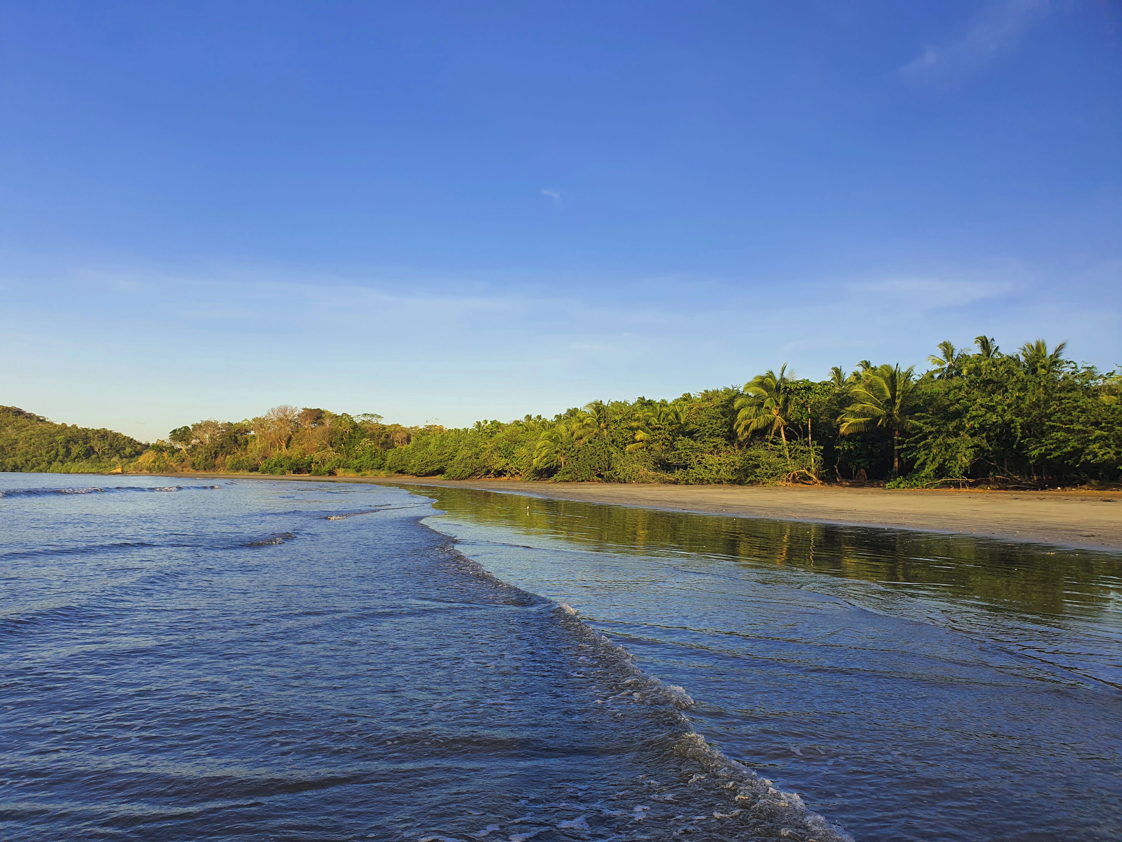 On the beach, sun-loungers, beach towels