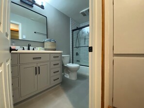 Hair dryer, towels, soap, shampoo
