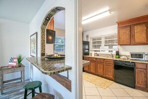 Fridge, microwave, oven, stovetop - Gulfport Cottage 1 Mile From Beach! pet friendly (Gulfport)