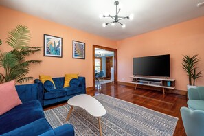 Smart TV, fireplace, foosball, books