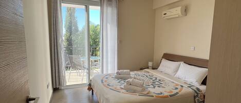 2 dormitorios, tabla de planchar con plancha, wifi y ropa de cama