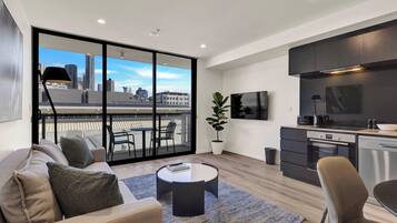Apartment, 1 King Bed, Non Smoking, Kitchen | Living area | 42-inch flat-screen TV with digital channels