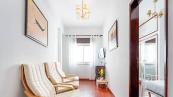 2 dormitorios, tabla de planchar con plancha, wifi gratis y ropa de cama