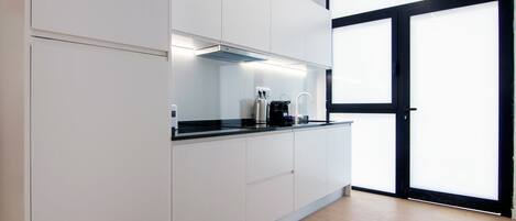 Fridge, microwave, stovetop, coffee/tea maker