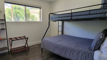 3 bedrooms, desk, iron/ironing board, travel cot