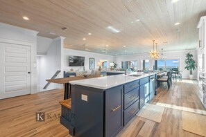 Fridge, microwave, oven, stovetop - Brand New Lavish Gulf Front Home | Entertainment Deck, Pool & Boardwalk, Nashville Beach By Kaiser (Gulf Shores)