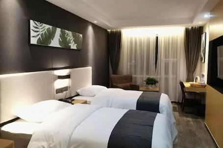 Habitación. Shankee Hotel (Junan County Longshan Road)