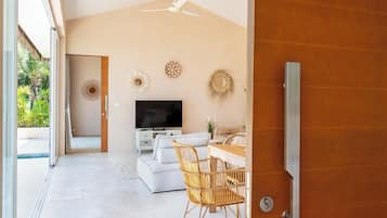 Exclusive Villa, Patio, Ocean View | Living area | Flat-screen TV