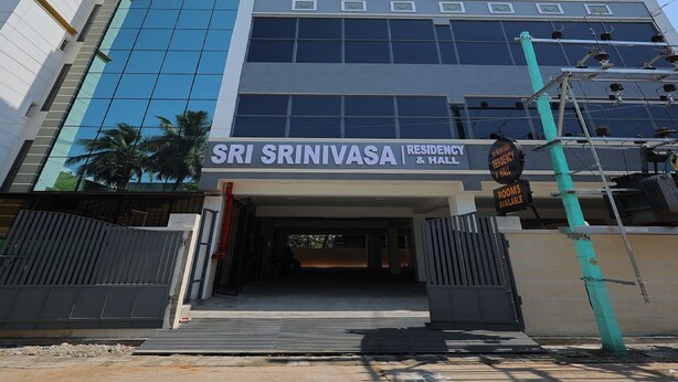 A modern building with a sign reading "SRI SRINIVASA RESIDENCY & HALL". - Sri Srinivasa Residency (Puducherry)