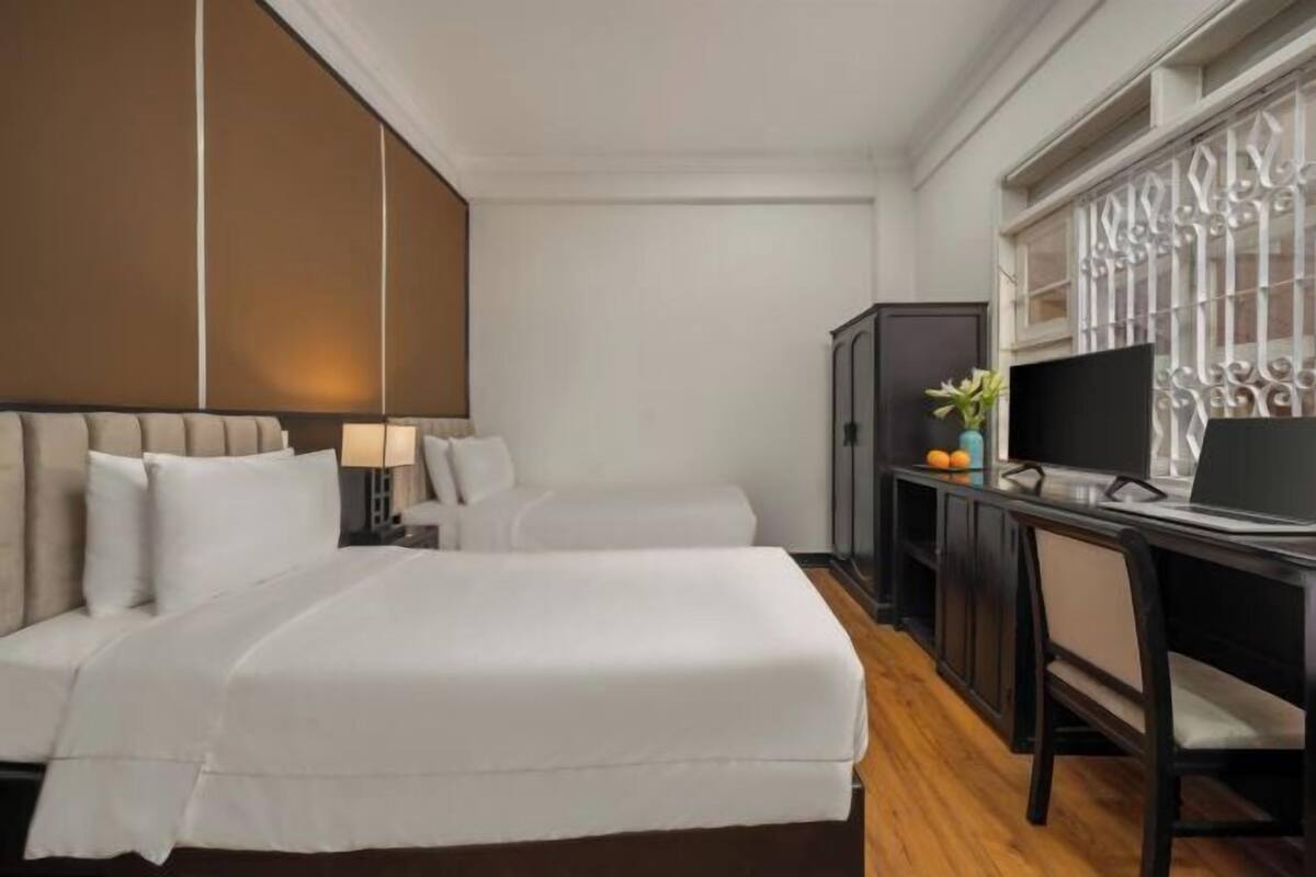 Premium bedding, pillow-top beds, desk, blackout curtains