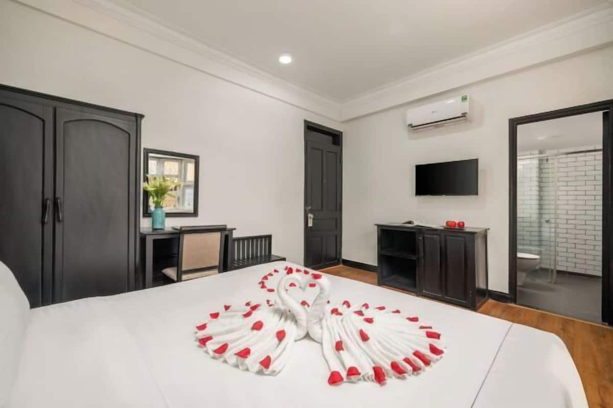 Premium bedding, pillow-top beds, desk, blackout curtains