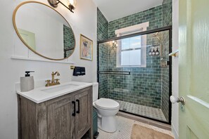Shower, hair dryer, towels, soap