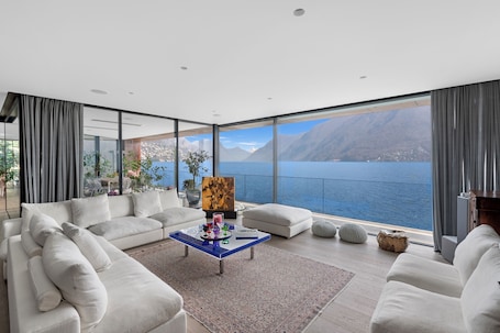 Family Villa, 3 Bedrooms, 2 Bathrooms, Lakeside (Maison Sur l'Eau) | Living area | 21-inch flat-screen TV with cable channels, TV