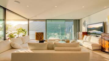 Family Villa, Multiple Bedrooms, Lakeside (Maison Sur l'Eau) | Living area | 21-inch flat-screen TV with cable channels, TV