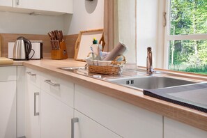 Réfrigérateur, four, plaque de cuisson, lave-vaisselle