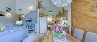 Pristine Pines: Bright Uptown Condo w/ Cozy Fireplace, Large Deck, Mountain Views, Walk to Amenities