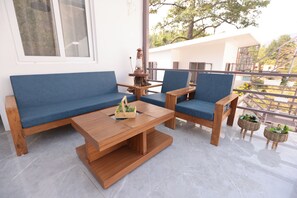 Deluxe Villa | Living area | 32-inch LED TV with cable channels - Krita Retreat (Dehradun)