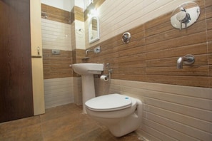 Shower, rainfall showerhead, towels, soap