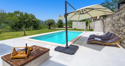Discover a cozy vacation home in Grižane, designed for up to four guests.