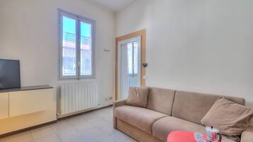 21-inch flat-screen TV with cable channels