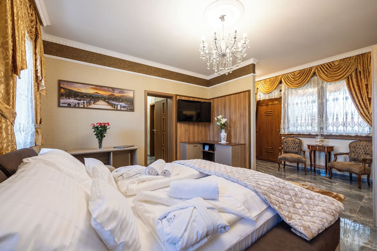 Family Double Room, Garden View | In-room safe, desk, blackout curtains, iron/ironing board (on request)