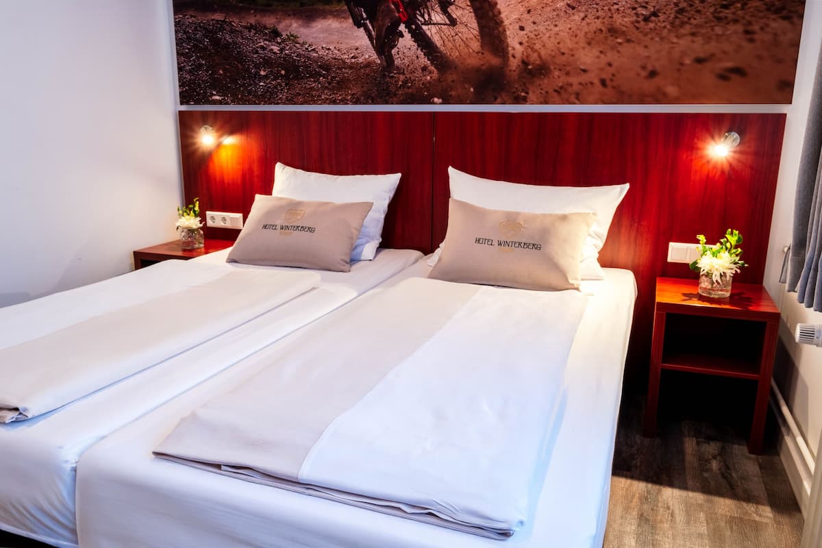 Tweepersoonskamer | Een kluis op de kamer, gratis wifi, beddengoed