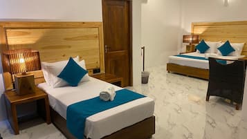 Kamar Triple Deluks | Meja kerja, kedap suara, Wi-Fi gratis, dan seprai linen