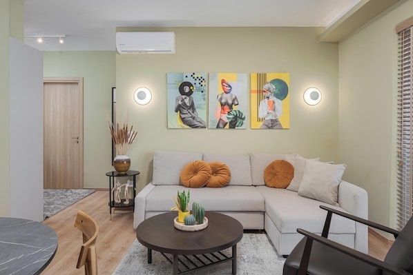 Luxury Apartment | Living area | 55-inch Smart TV with digital channels