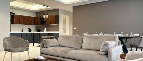Design Apartment, 3 Bedrooms | Living area | Flat-screen TV