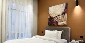 Design Apartment, 3 Bedrooms | 3 bedrooms, blackout drapes, iron/ironing board, free WiFi