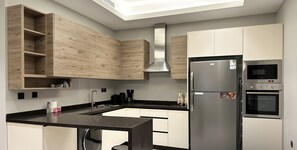 Design Apartment, 3 Bedrooms | Private kitchen | Electric kettle - Kease King Salman G-1 Lusso Najd GX96 (Riyadh)