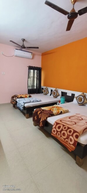 Family Room | Free WiFi, bed sheets - Hotel laxmi Dwarka (Dwarka)