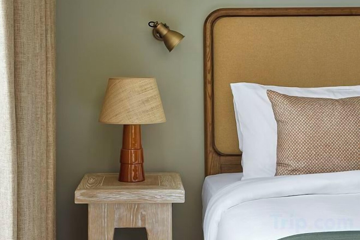 Een kluis op de kamer, verduisterende gordijnen, gratis wifi, beddengoed