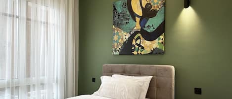 Design Apartment, 3 Bedrooms | 3 bedrooms, blackout drapes, iron/ironing board, free WiFi