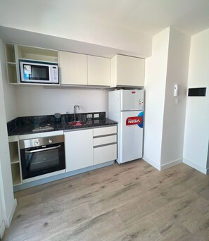 Fridge, microwave, oven, coffee/tea maker