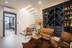 Exclusive Villa, Patio, Sea View | Living area | 150-cm TV with digital channels