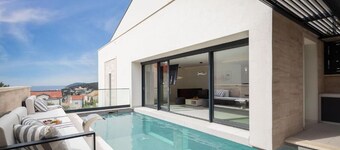 white residence with pool room 