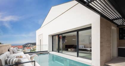 white residence with pool room