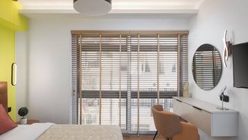 1 bedroom, desk, iron/ironing board, travel crib