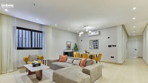 Apartment, 3 Bedrooms, Kitchen | Living area - bnbmehomes- Stay nr Granada Mall-32B4 (Riyadh)