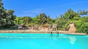 Seasonal outdoor pool, pool umbrellas, pool loungers