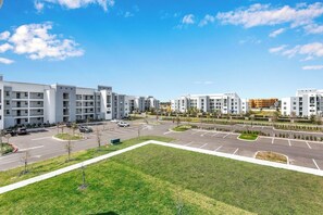 Spacious outdoor parking available, conveniently located near the condo entrance. - 3BR Condo w/Balcony & Waterpark Access near Disney (Kissimmee)