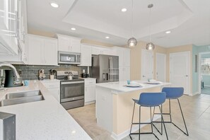 - Sublime and fully equipped kitchen of the condo in Kissimmee - Sufficient space to work according to your ease - Plenty of storage space - Stainless steel appliances with other accessories available - High chairs available at the breakfast counter - 3BR Condo w/Balcony & Waterpark Access near Disney (Kissimmee)
