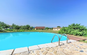 Seasonal outdoor pool, pool umbrellas, sun loungers