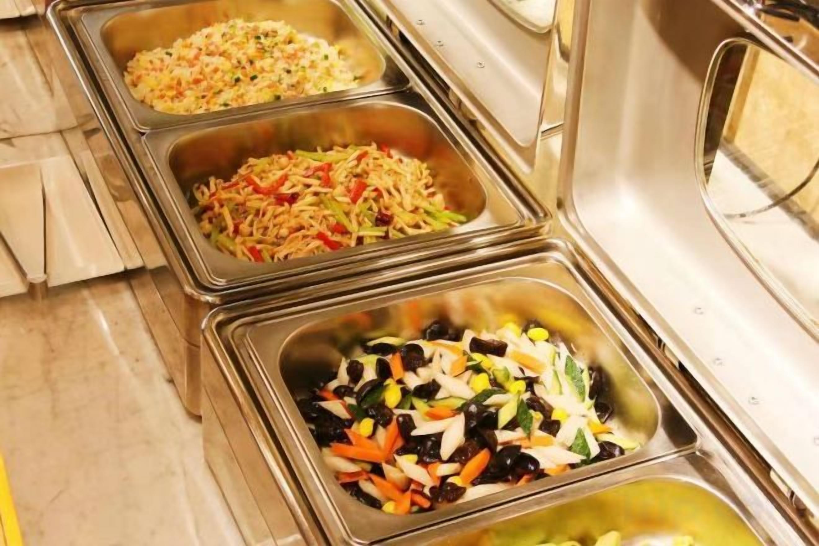 A buffet with multiple food stations.