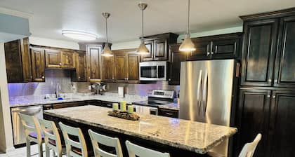 Beautifully Remodeled Condo with 1st Floor Access Steps Away from Beach