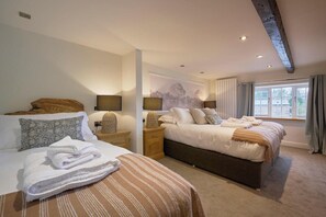 Family Room | In-room safe, desk, laptop workspace, blackout curtains