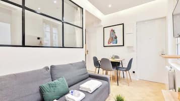 Apartamento urbano | Área de estar | TV