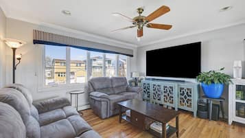 Smart TV, fireplace, foosball, books