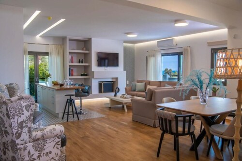 Almyros Houses, by the sea, I-N